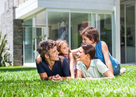 Family Outside Their House